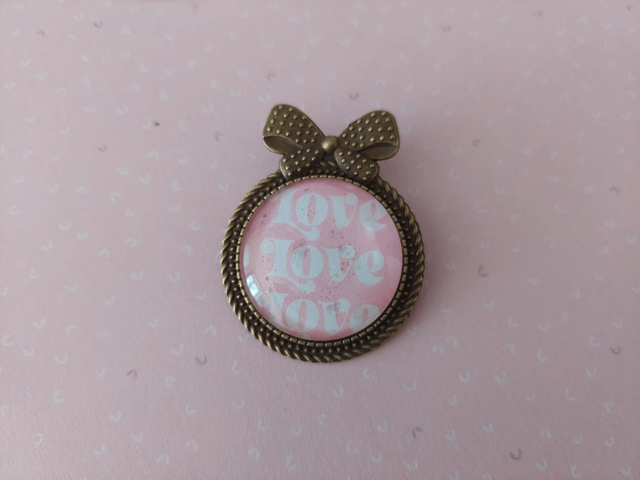 Broche Noeud Love rose