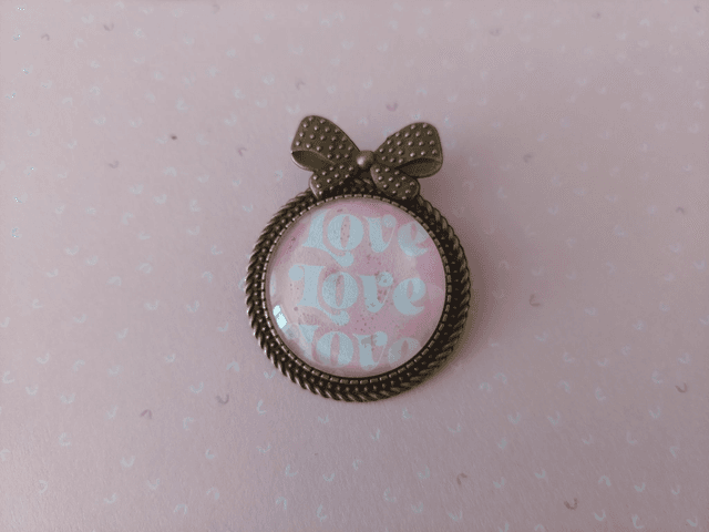 Broche Noeud Love rose